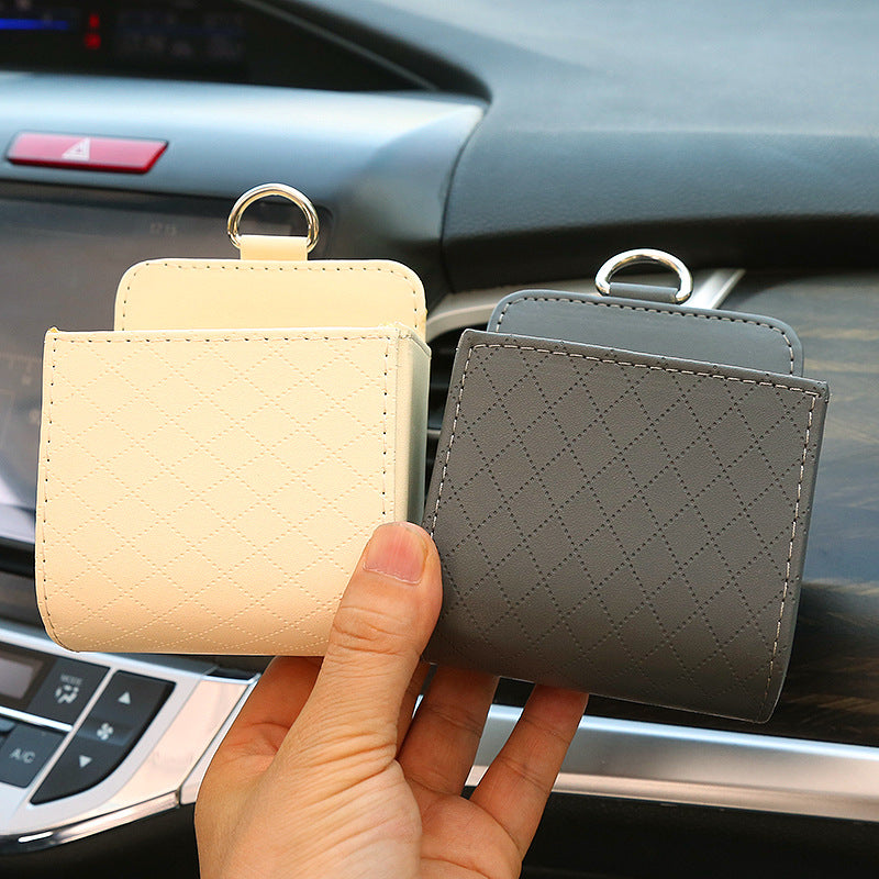 Car storage box, car air vents, leather multi-function pocket for mobile phones, cigarettes, coins, cards and drinks.