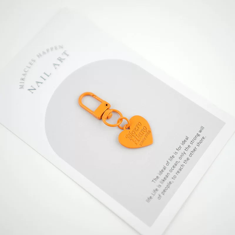 Ürək formalı kulon, konfet rəngli şarf, AirPods metal açar zənciri, Koreya hərfli qulaqcıqlar, çantalar üçün ürək formalı aksessuarlar.