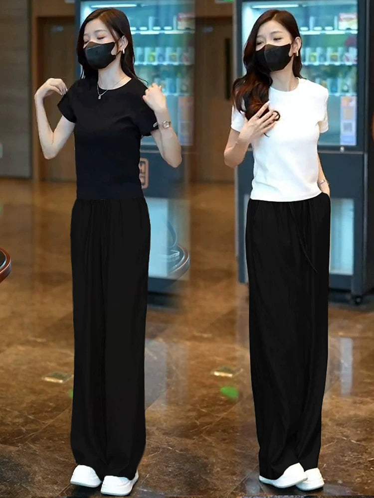 Qadınlar üçün tam yay moda paltarı. Bu ilin məşhur arıqlayan qısaqol köynək + buz ipək geniş paçalı şalvar iki parça dəsti