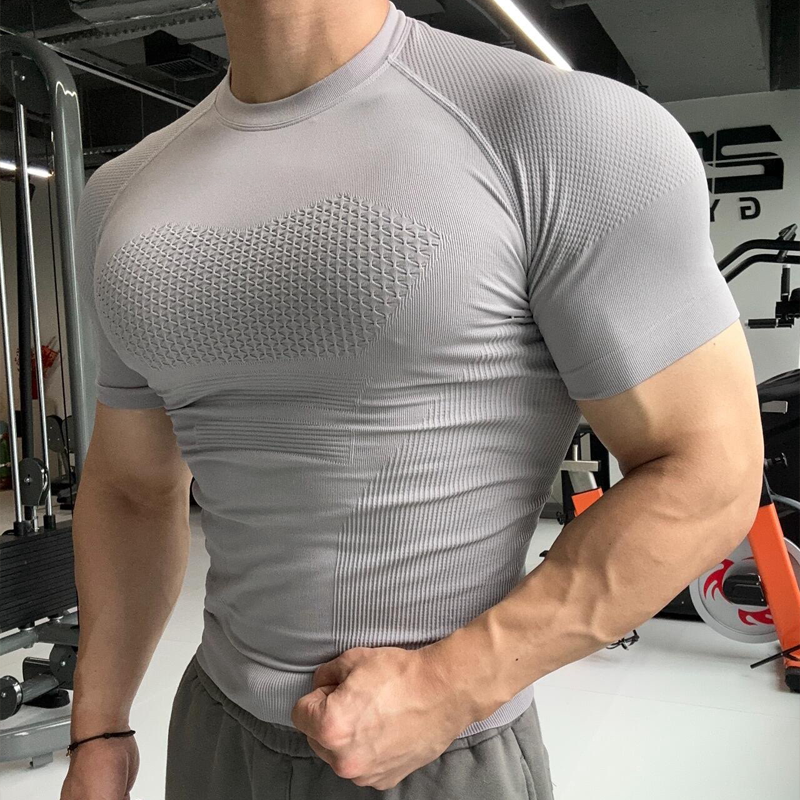 GYM elastik peşəkar fitness geyimi tikişsiz qısaqol idman köynəyi kişi qaçış məşqi tez quruyan sıxılma sıx açıq geyim