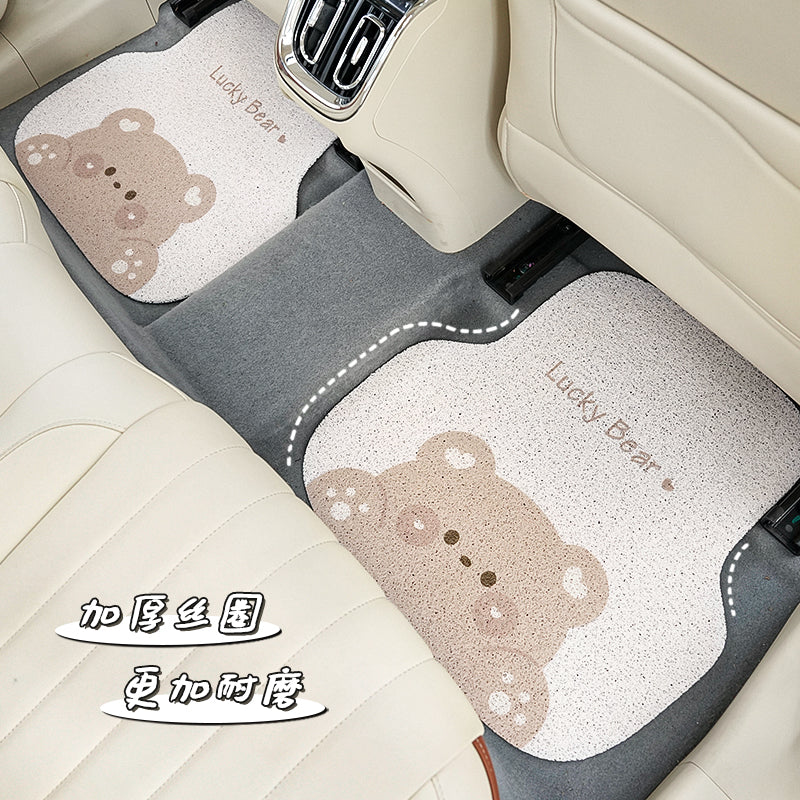 Cizgi filmi şirin dolğun ayı dizaynlı, ilgək parçalı, ləkəyə davamlı və suya davamlı universal avtomobil döşəmələri