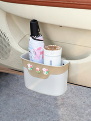 Car trash can, side door storage, interior premium feature seat back multi-function storage umbrella holder