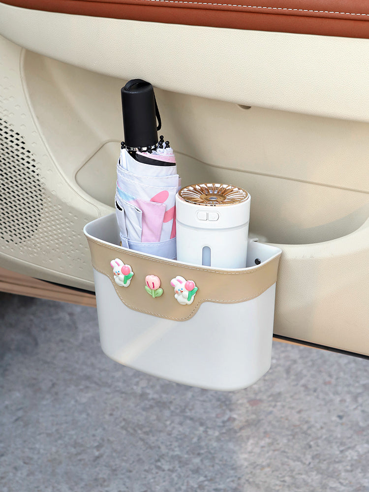 Car trash can, side door storage, interior premium feature seat back multi-function storage umbrella holder