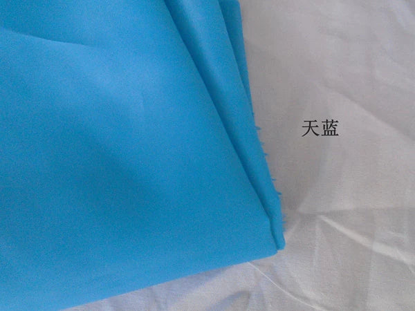 Bərk rəngli kimyəvi lifli parça, polyester paltar astarlı parça, çanta yubka astarlı parça, toy səhnə tərtibatı dekorativ parça